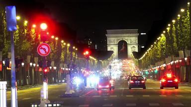 巴黎法国约晚上交通灯香榭丽舍大街弧胜利